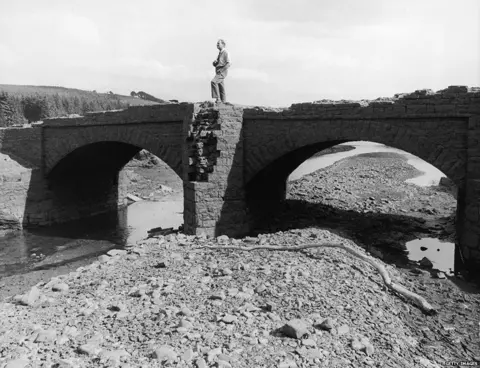 Getty Images This bridge in the Llwyn Onn Reservoir had been submerged for 50 years but reappeared due to low water levels