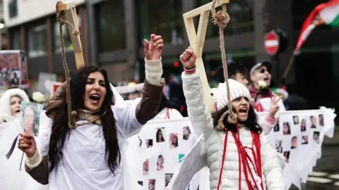 PA Media File photo showing demonstrators marching through London to protest against Iran's execution of protesters, on 8 January 2023