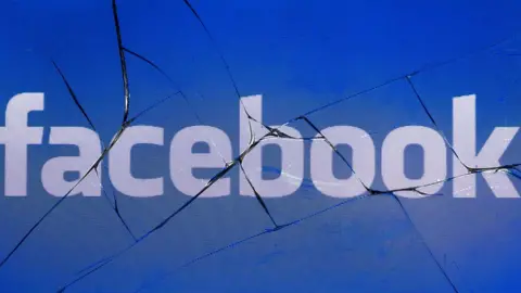 AFP/Getty A Facebook logo displayed on a broken mobile phone screen