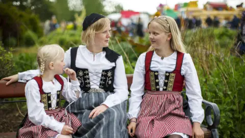Tolga Akmen/Anadolu Agency/Getty Images Family marking Icelandic National Day, 2016