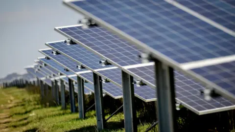 PA Media A solar farm in the UK