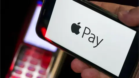 Getty Images Apple pay on an iPhone