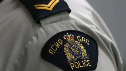 Reuters A Royal Canadian Mounted Police (RCMP) crest is seen on a member's uniform, at the RCMP "D" Division Headquarters in Winnipeg, Manitoba Canada, July 24, 2019.