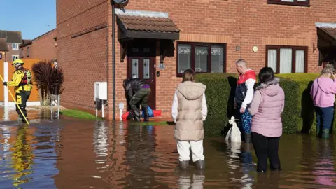 PA Media Flooding in Retford in Nottinghamshire, after Storm Babet battered the UK, causing widespread flooding and high winds.