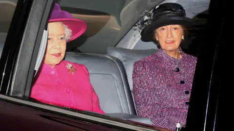 PA Media Lady Susan Hussey with the late Queen