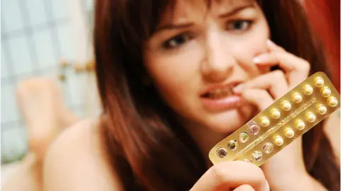 Getty Images Young woman anxious about her contraception