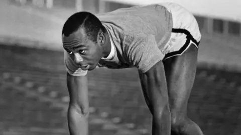 Getty Images Jim Hines held the world record in the men's 100m for nearly 15 years