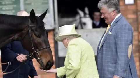 EPA The Queen meeting the champion horses owned by Paul Nicholls