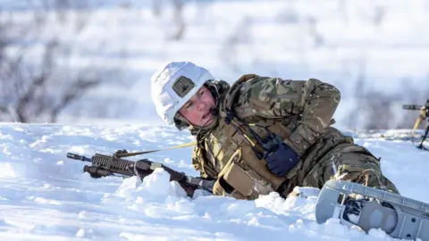 Royal Navy Royal Navy personnel in snow taking part in Operation Cold Response