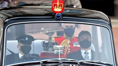 Getty Images The Imperial State Crown is driven from Buckingham Palace to the Houses of Parliament for the State Opening of Parliament