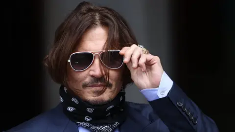 PA Media Johnny Depp outside the High Court on 17 July 2020
