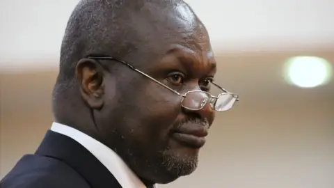 Reuters South Sudan"s First Vice President Riek Machar takes the oath of office at the State House in Juba, South Sudan, February 22, 2020