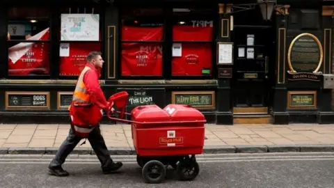 Reuters Postal worker in York