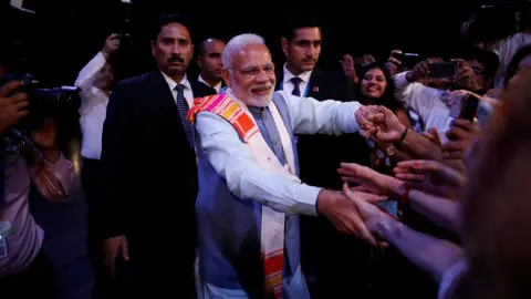 Reuters Indian Prime Minister Narendra Modi greets attendees at the Peace through Yoga meeting in Buenos Aires, Argentina, November 29, 2018