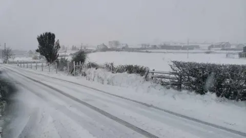 BBC Weather Watcher Michelle  Snow on a country road near Enniskillen