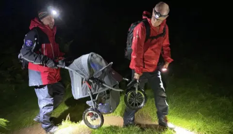 Patterdale Mountain Rescue Team Rescuers with the dog buggy