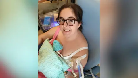 Family handout Natasha Hewitt with son Harry