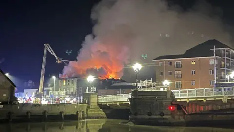 Andrew Turner/BBC Fire at Haven Bridge in Great Yarmouth