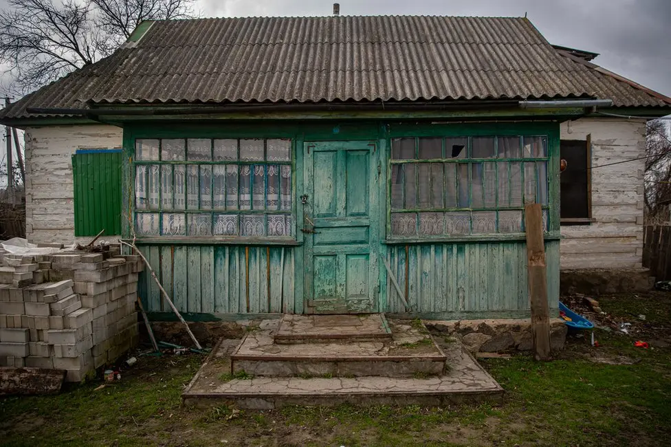 BBC Sasha and Nikita's house in Andriivka. They were pulled from the basement by Russian soldiers.