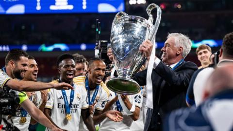 Real Madrid coach Carlo Ancelotti celebrates his sixth Champions League triumph