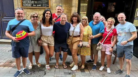 Andrew and Lisa with their tour group