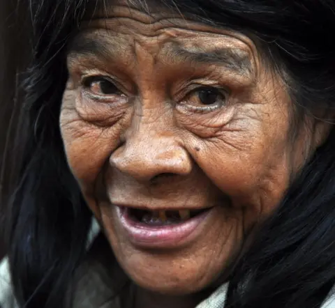 Getty Images An elderly Ache woman, photographed in 2014