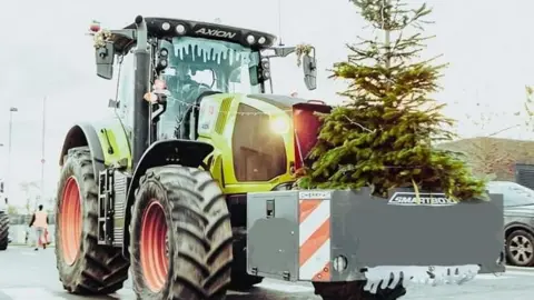 Liam Hopkins A tractor in Christmas lights