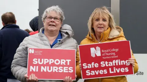 Pacemaker Two nurses on the picket line at the Ulster Hospital