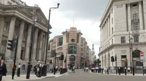 BBC Bank junction with people walking around 