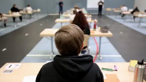 EPA This school sports hall in Germany has been converted into a classroom