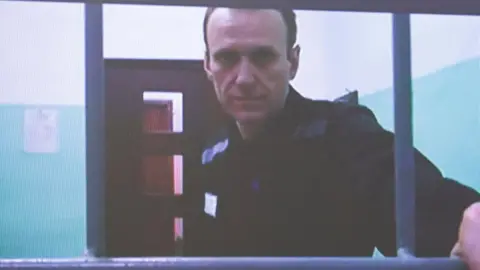 Reuters Alexey Navalny behind bars