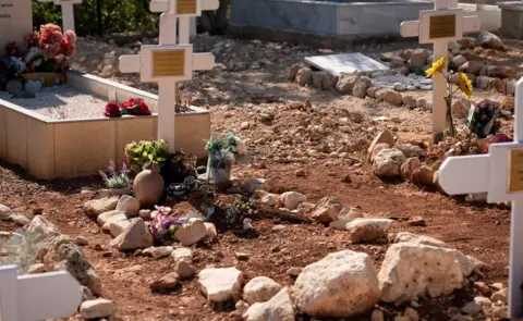 PA Media Janice Hunter's grave