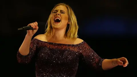 Getty Images Adele singing