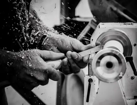 Roger Shezall Turning wood on a lathe