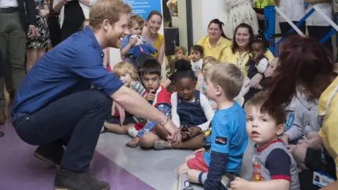 Danny Lawson/PA Prince Harry meets staff and families at the hospital