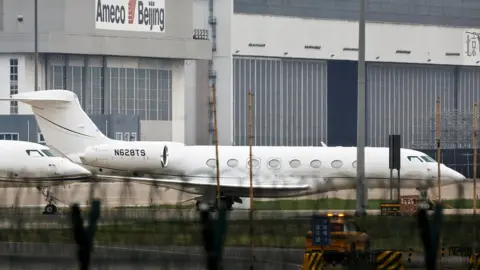 Reuters Tesla chief executive Elon Musk's private jet is seen at Beijing Capital International Airport in Beijing, China.