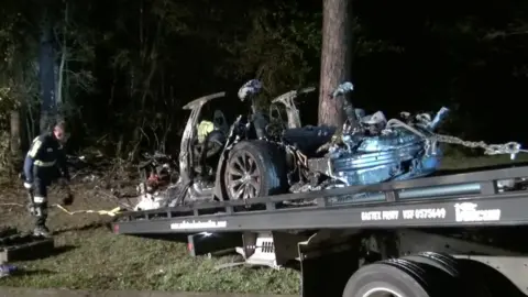 Scott J Engle/Reuters The remains of a Tesla vehicle are seen after it crashed in The Woodlands, Texas