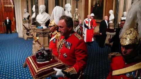 AFP The Imperial State Crown being carried into Parliament