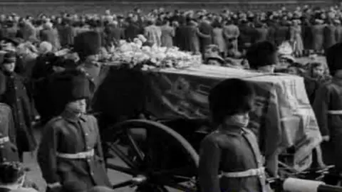 British Pathe George VI's coffin at Wolferton station in 1952