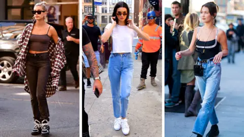 Getty Images Models Hailey Baldwin, Kendall Jenner and Bella Hadid wearing the 'mom' jean