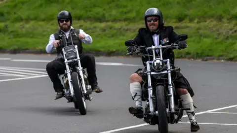 Del Hickey Sean Good and a member of the Brsitol DGR riding their motorcycles