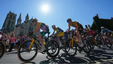 PA Media Riders passing Howden Minster