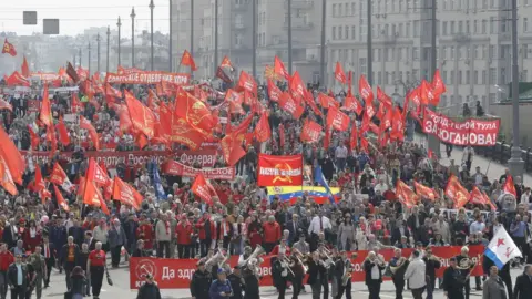Reuters Supporters of left-wing political parties and movements attend a May Day rally in central Moscow, Russia May 1, 2018.