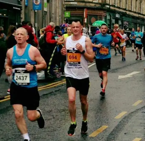 Iain Murphy  Iain running a marathon