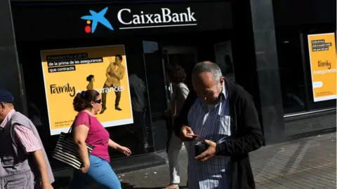 Reuters CaixaBank branch