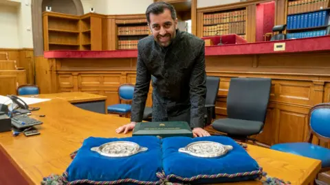 Getty Images Humza Yousaf being sworn in as first minister