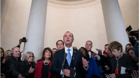 Getty Images Adam Schiff, a Democrat from California and chairman of the House Intelligence Committee, answers questions from members of the media after a House Intelligence Committee