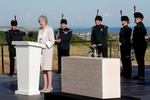 Reuters Mrs May delivers a speech