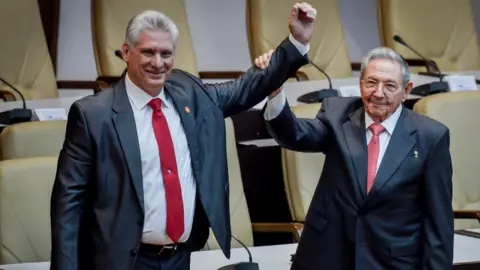 AFP President Miguel Díaz-Canel (left) and Raúl Castro