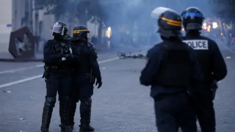 EPA Riot police during clashes after a demonstration in memory of 17-year-old Nahel who was killed by French Police in Marseille, France, 30 June 2023